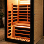 Wooden sauna with interior lights on a neutral background